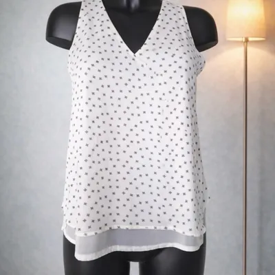 Jolie top femme sans manche taille S 